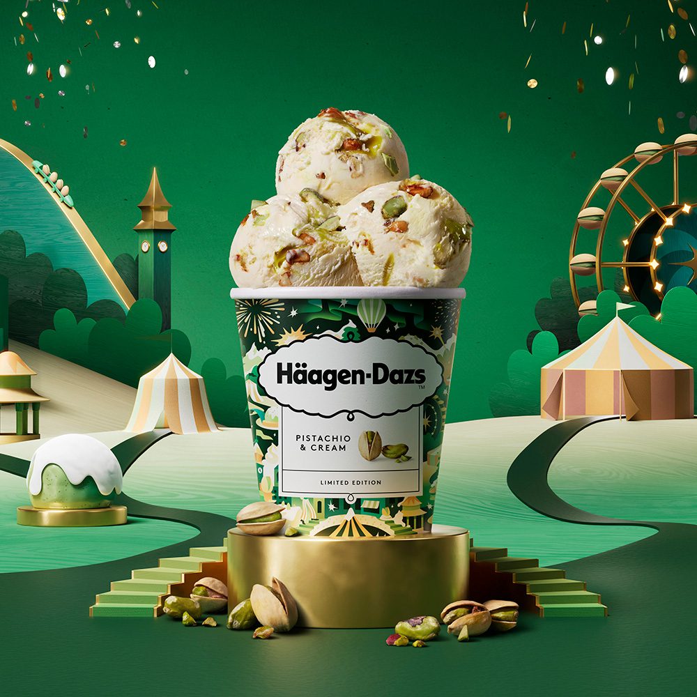 A tub of Haagen Dazs ice cream on a festive green background