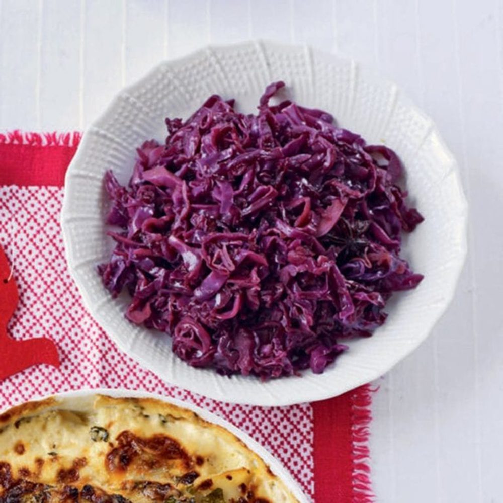 A white bowl filled with spiced red cabbage