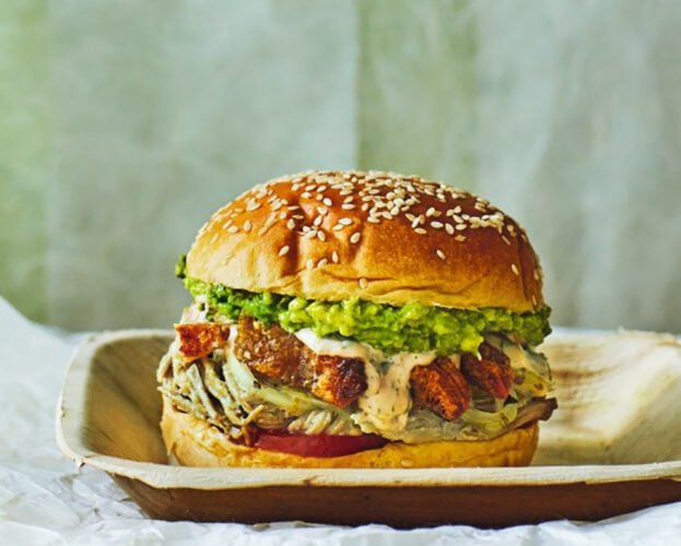 Leftover roast pork in a bun with avocado and tomato
