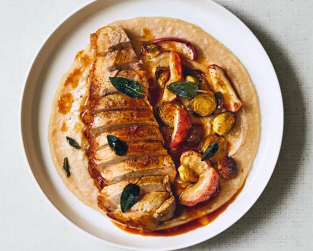 Pork chops with bean pureé, sprouts and apples