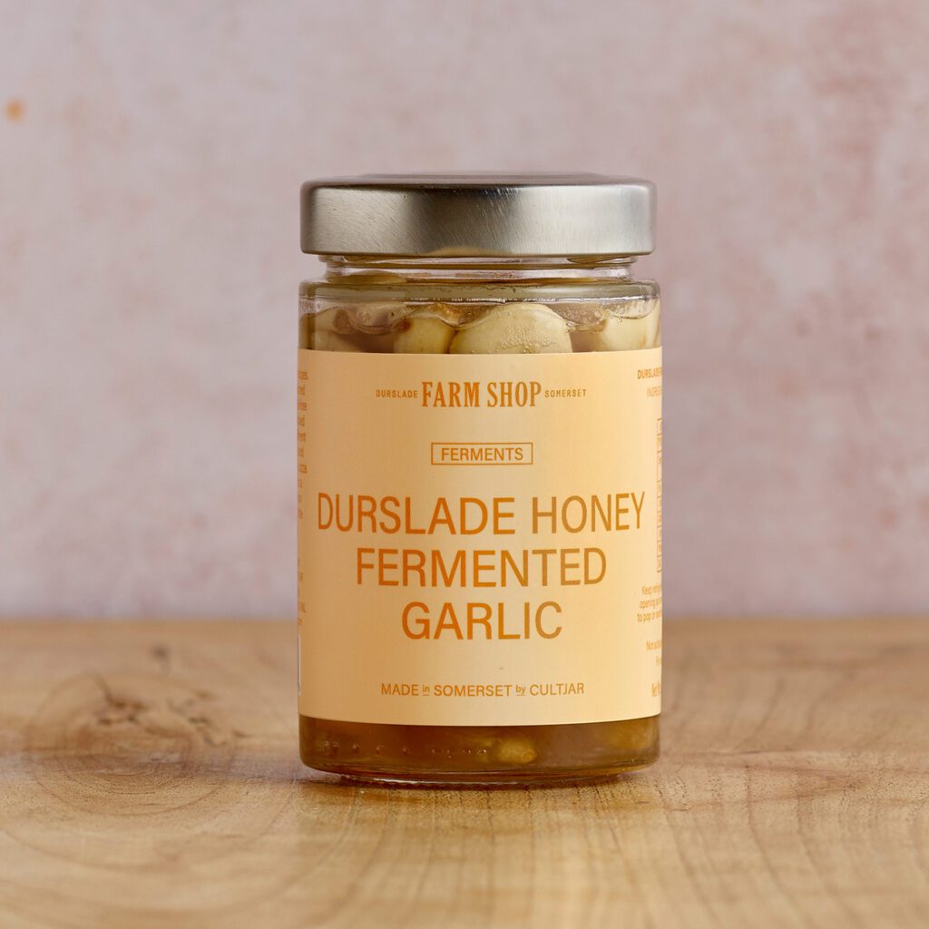 A jar of honey fermented garlic by Cultjar for Durslade Farm Shop