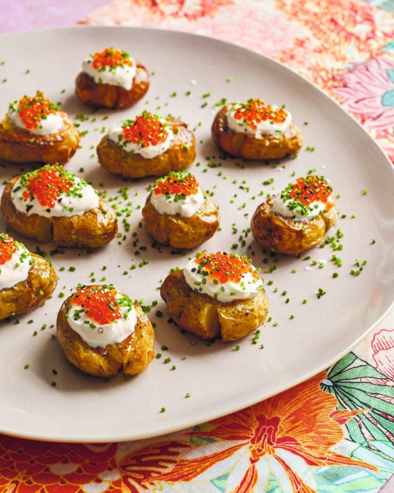 Smashed potatoes with crème fraîche and roe