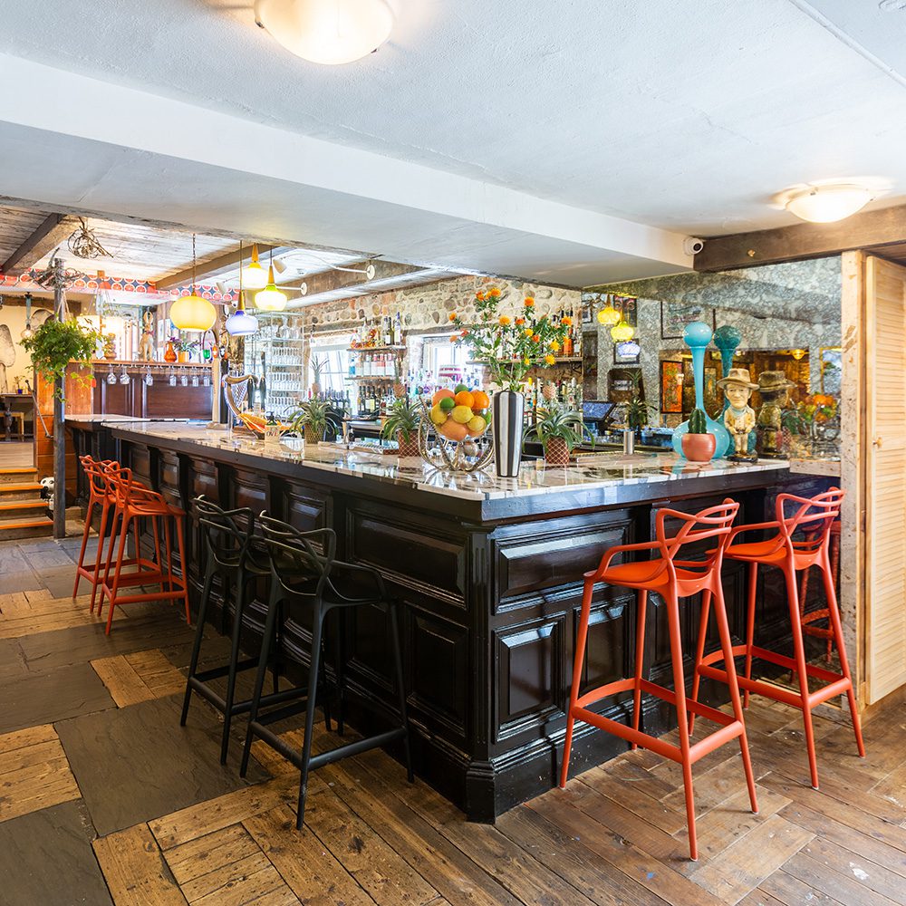 The colourful bar at The Cartford Inn