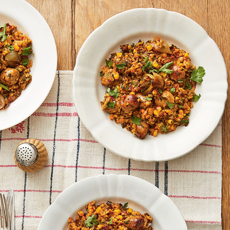 Image of harissa baked rice with sausage from cookbook Every Last Bite by Rosie Sykes