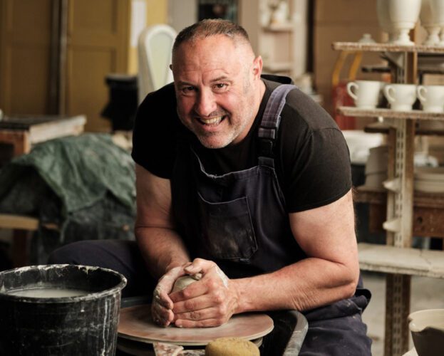 A portait of Keith Brymer Jones at his pottery wheel