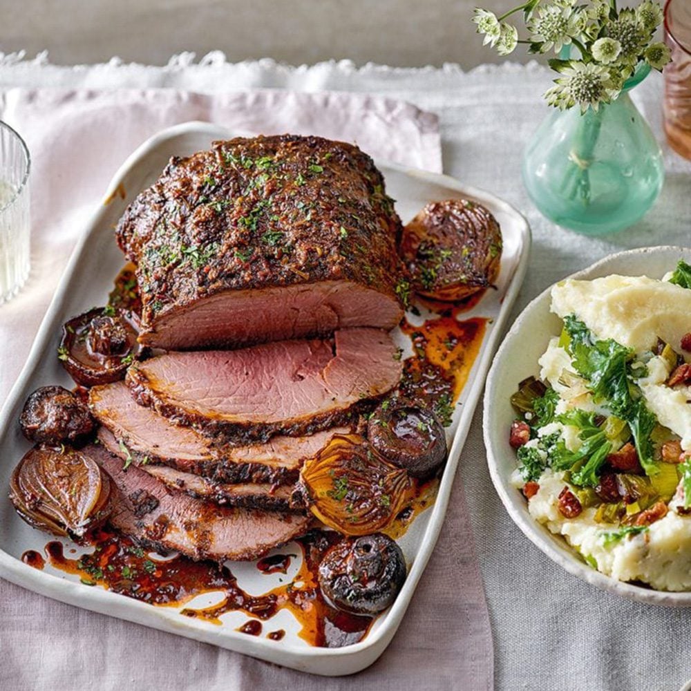 A joint of roast beef, carved into slices