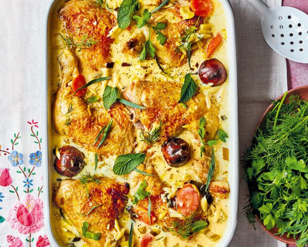 A dish of braised chicken in kefir, topped with herbs