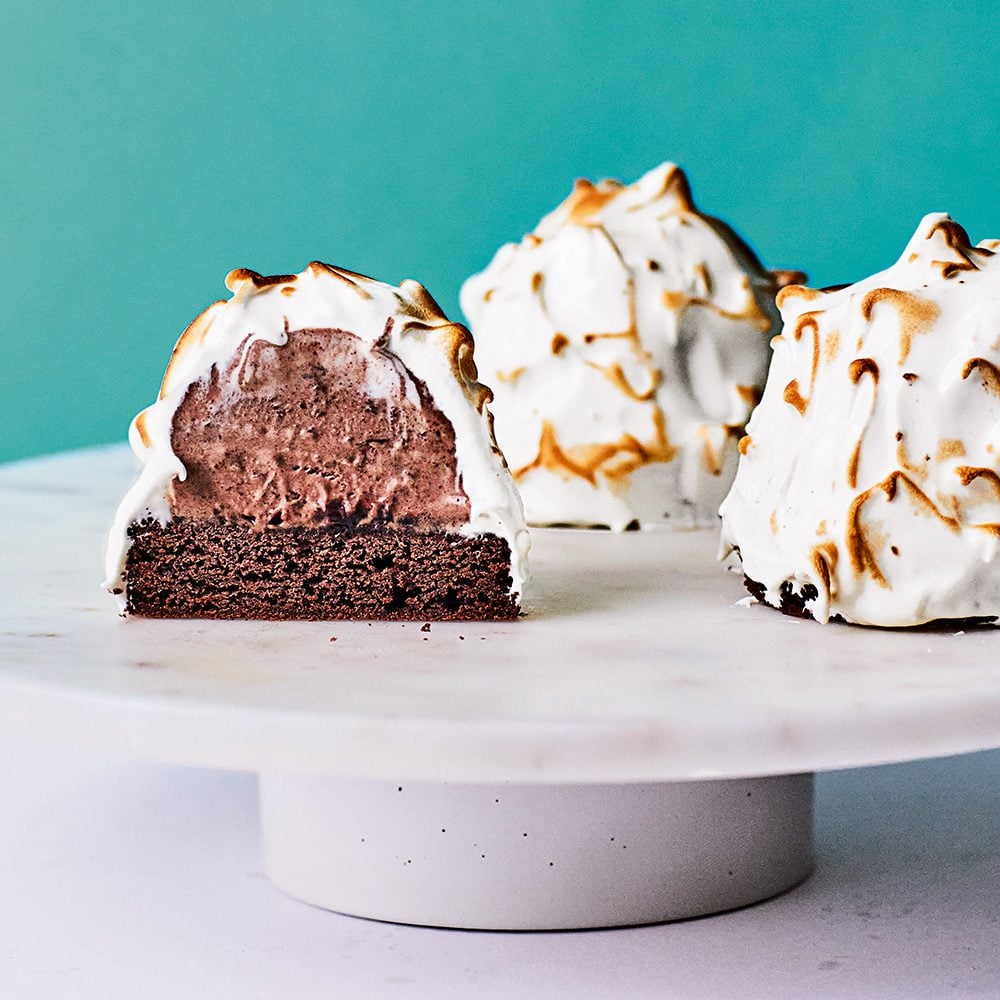 Mini baked alaskas on a cake stand