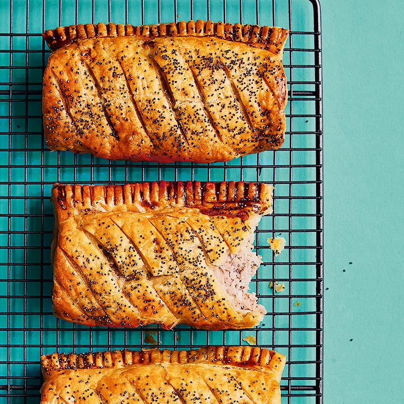 Sausage rolls on a cooling rack