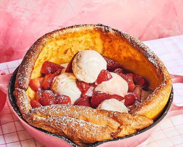 Strawberry dutch baby with strawberry-top syrup