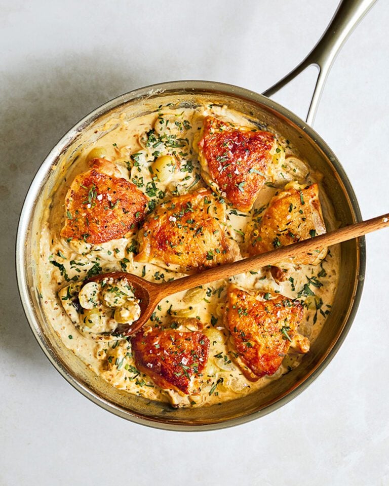 Chicken thighs in a mustard, tarragon and grape pan sauce