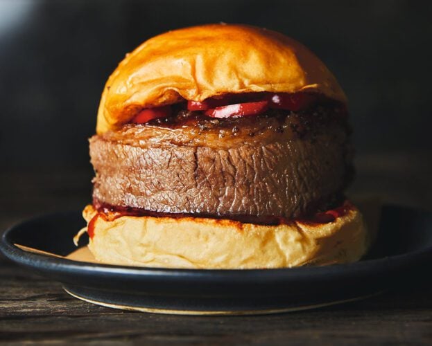 Smoked brisket buns with mustard barbecue sauce and pickled chillies