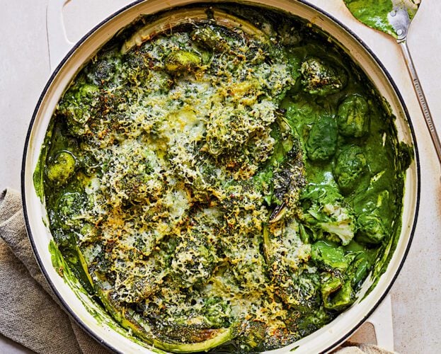 Green cauliflower cheese gnocchi in a large white casserole dish
