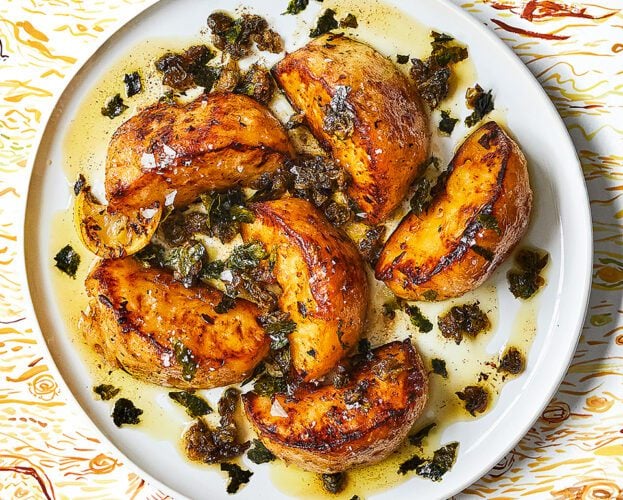A plate of salt-baked celeriac wedges with seaweed and crispy capers