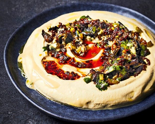 Houmous with caramelised aubergine, pomegranate and chilli crisp