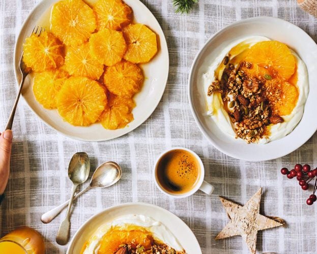 Poached oranges with mascarpone yogurt and festive granola