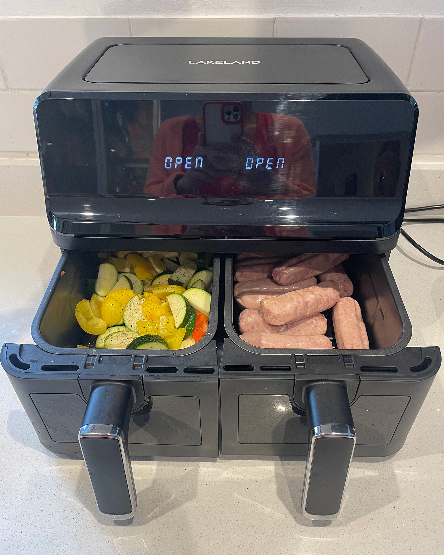 Lakeland Dual Basket Air Fryer with Easy View Windows with vegetables and pork sausages
