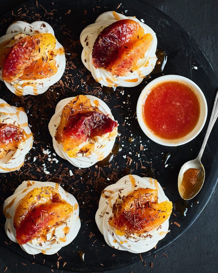 Mini chocolate and blood orange pavlovas