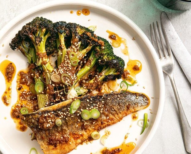 Broccoli steaks with crispy sea bass, five-spice potatoes and peanut and chilli sauce