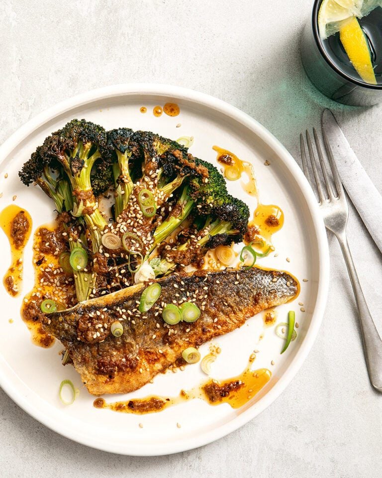 Broccoli steaks with crispy sea bass, five-spice potatoes and peanut and chilli sauce