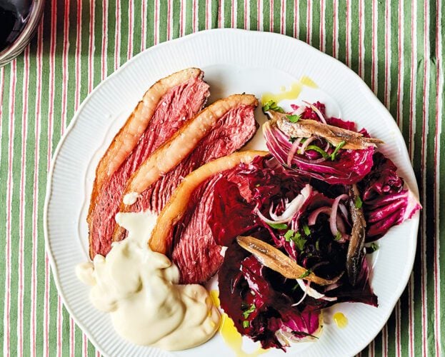 Picanha steak with parmesan fonduta, radicchio, anchovies and shallots