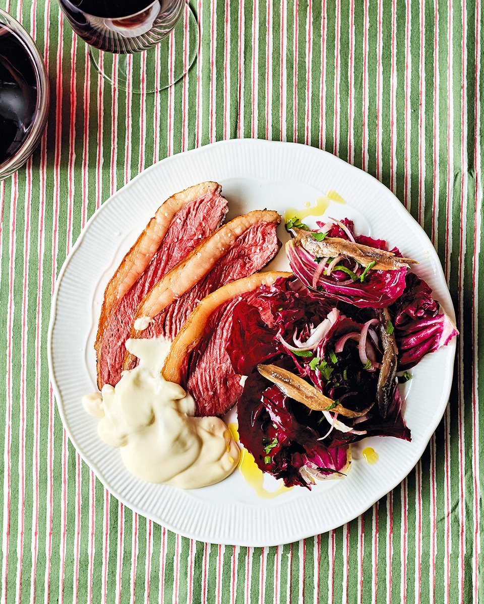 Picanha steak with parmesan fonduta, radicchio, anchovies and shallots