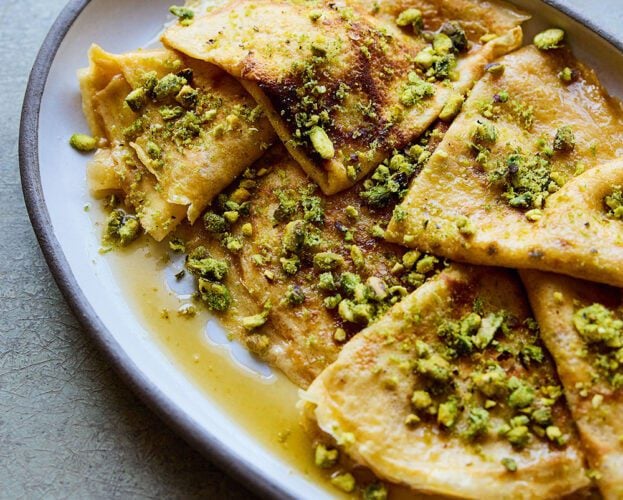 Cardamom pancakes with honey lime syrup
