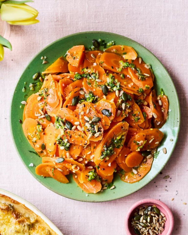 Steamed carrots with spring onion and chive butter