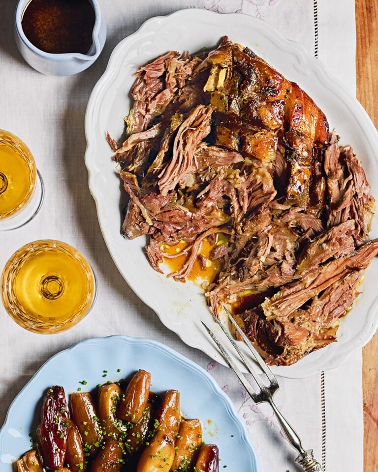Slow-cooked orange wine lamb shoulder with shallots