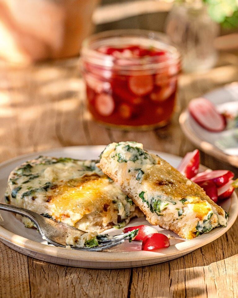 Nettle rarebit crumpets with pickled radishes