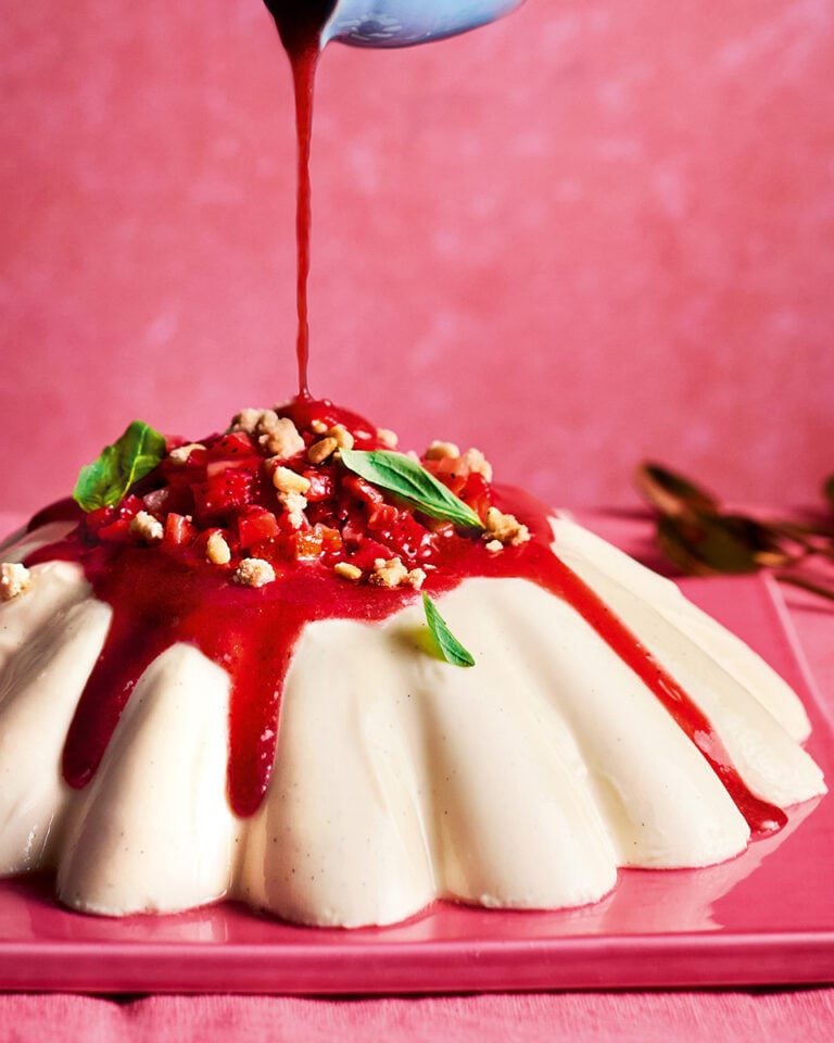 Giant yogurt pannacotta with strawberry coulis