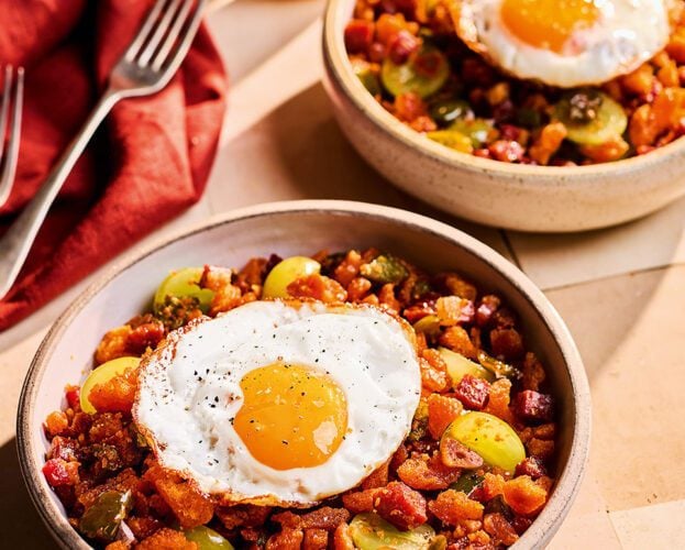 Spanish migas with fried eggs