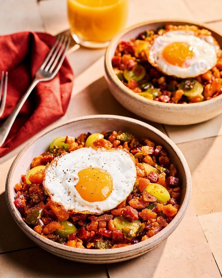 Spanish migas with fried eggs