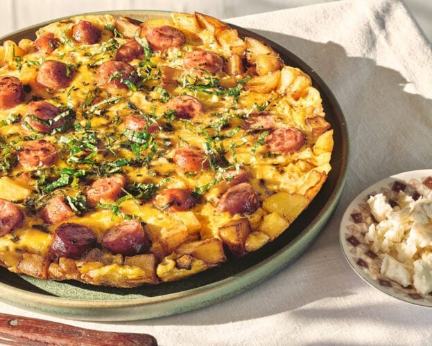 Fourtalia (Greek omelette with sausages, potatoes and mint)