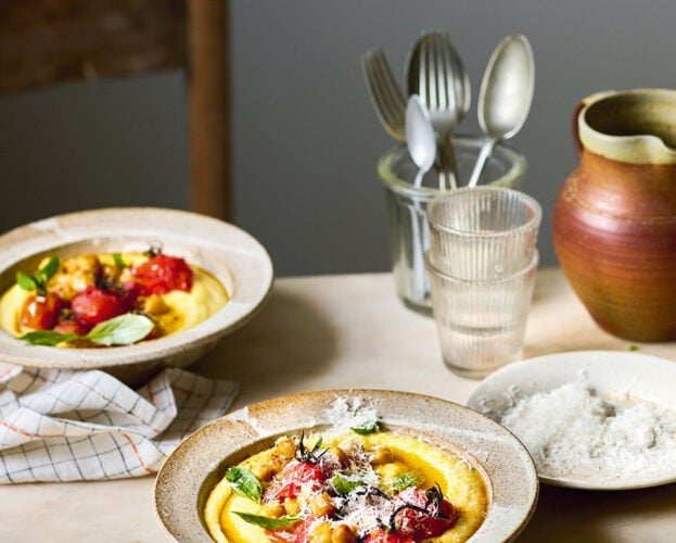 Blistered tomatoes and chickpeas on creamy polenta
